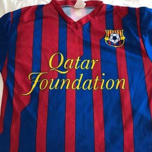Qatar foundation small football shirt.